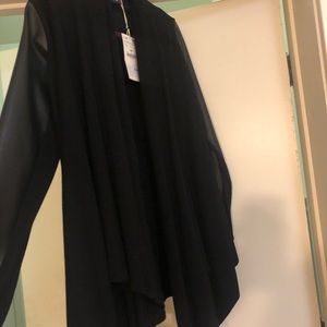 Zara Jackets & Coats - NEVER WORN black sweater with faux leather sleeves Zara Jackets & Coats - NEVER WORN black sweater with faux leather sleeves